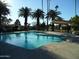 Inviting community pool with a relaxing patio area at 2208 W Lindner Ave # 17, Mesa, AZ 85202