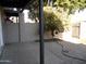 Private patio with brick pavers and small tree at 2208 W Lindner Ave # 17, Mesa, AZ 85202