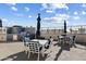 Outdoor kitchen and dining area on rooftop at 2211 E Camelback Rd # 201, Phoenix, AZ 85016