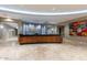 Elegant lobby with wood-paneled reception desk at 2211 E Camelback Rd # 201, Phoenix, AZ 85016