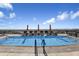 Rooftop pool with lounge chairs and city views at 2211 E Camelback Rd # 201, Phoenix, AZ 85016