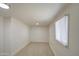 Bright bedroom with wood floors and window coverings at 232 S San Carlos St, Florence, AZ 85132