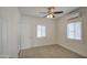 Charming bedroom with ceiling fan and wood floors at 232 S San Carlos St, Florence, AZ 85132