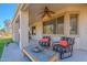 Outdoor patio with ceiling fan and seating, perfect for enjoying the fresh air at 2418 E Glass Ln, Phoenix, AZ 85042