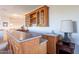 Stylish wet bar area featuring sleek countertops, cabinets, and a sink at 2418 E Glass Ln, Phoenix, AZ 85042