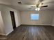 Bright bedroom with wood-look floors and ample closet space at 2523 N 28Th St, Phoenix, AZ 85008