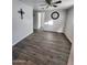 Second bedroom with wood-look flooring and ceiling fan at 2523 N 28Th St, Phoenix, AZ 85008