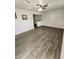 Spacious living room featuring wood-look flooring at 2523 N 28Th St, Phoenix, AZ 85008