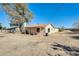 Ranch house with covered porch and yard at 26207 S Lime Dr, Queen Creek, AZ 85142