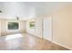 Bright living room with tile floors and large windows at 26207 S Lime Dr, Queen Creek, AZ 85142