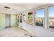 Sunroom with floral wallpaper and backyard access at 26207 S Lime Dr, Queen Creek, AZ 85142