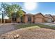 Attractive curb appeal with a landscaped yard and a two-car garage at 2673 W Ivanhoe St, Chandler, AZ 85224