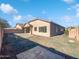 Landscaped backyard with gravel and concrete patio at 3057 E Superior Rd, San Tan Valley, AZ 85143