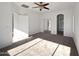 Well-lit bedroom featuring a large closet and neutral carpeting at 3057 E Superior Rd, San Tan Valley, AZ 85143