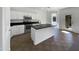 Modern kitchen with white cabinets and granite countertops at 3057 E Superior Rd, San Tan Valley, AZ 85143