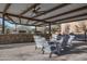 Outdoor kitchen with grills and seating at 32029 N 19Th Ln, Phoenix, AZ 85085