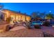 Inviting backyard with a sparkling pool, patio furniture, and lush landscaping at 32029 N 19Th Ln, Phoenix, AZ 85085