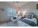 Bedroom with two twin beds and white shutters at 32029 N 19Th Ln, Phoenix, AZ 85085