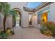 Brick paved courtyard with palm tree, lighting, and access to interior at 32029 N 19Th Ln, Phoenix, AZ 85085