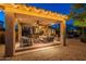 Covered patio with wicker furniture, string lights, and ceiling fan at 32029 N 19Th Ln, Phoenix, AZ 85085