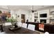 Open concept dining area with farmhouse table and kitchen views at 32029 N 19Th Ln, Phoenix, AZ 85085