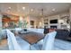 Bright dining area with a rustic wooden table and seating for six at 32029 N 19Th Ln, Phoenix, AZ 85085