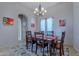 Formal dining room with wood table, chairs, and a chandelier at 32029 N 19Th Ln, Phoenix, AZ 85085