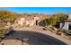 Single story home with a circular driveway and desert landscaping at 32029 N 19Th Ln, Phoenix, AZ 85085