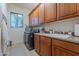 Laundry room with sink, cabinets, and washer/dryer hookups at 32029 N 19Th Ln, Phoenix, AZ 85085