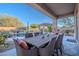 Patio with a large table and chairs, overlooking the pool at 32029 N 19Th Ln, Phoenix, AZ 85085