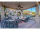 Covered patio with wicker furniture and ceiling fan at 32029 N 19Th Ln, Phoenix, AZ 85085