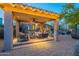 Covered patio with seating and string lights at 32029 N 19Th Ln, Phoenix, AZ 85085