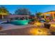 Relaxing pool area with a waterfall, and lighting at 32029 N 19Th Ln, Phoenix, AZ 85085