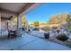 Spacious backyard with a pool and patio seating at 32029 N 19Th Ln, Phoenix, AZ 85085