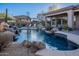 Resort-style pool with a covered patio and comfortable lounge chairs at 32029 N 19Th Ln, Phoenix, AZ 85085