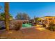 Landscaped backyard with a stunning pool and spa at 32029 N 19Th Ln, Phoenix, AZ 85085