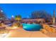 Stunning kidney shaped pool and spa with waterfall feature and lighting at 32029 N 19Th Ln, Phoenix, AZ 85085