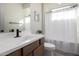 Clean bathroom with white vanity, bathtub, and modern fixtures at 32040 N Lisadre Ln, San Tan Valley, AZ 85144