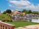 Scenic San Tan Heights entrance featuring a waterfall and lush landscaping with mountain views at 32040 N Lisadre Ln, San Tan Valley, AZ 85144