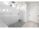 Large walk-in shower with glass enclosure and multiple shower heads at 32040 N Lisadre Ln, San Tan Valley, AZ 85144