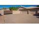 Two-car garage with large concrete driveway at 3464 N Ashbrook St, Mesa, AZ 85213