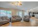 Bright living room with views of the backyard and kitchen at 3464 N Ashbrook St, Mesa, AZ 85213