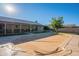 Backyard pool with tan cover and covered patio at 3464 N Ashbrook St, Mesa, AZ 85213