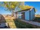 Metal storage shed with double doors in backyard at 3464 N Ashbrook St, Mesa, AZ 85213