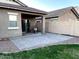 Spacious backyard with a paved patio and small lawn at 35801 N Zachary Rd, San Tan Valley, AZ 85144