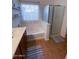 Bathroom features a large shower and a bathtub at 35801 N Zachary Rd, San Tan Valley, AZ 85144