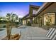 Modern backyard featuring a pool, lounge chairs, desert landscaping, and exterior view of the home at 39493 N 107Th Way, Scottsdale, AZ 85262