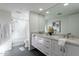 Elegant bathroom with double vanity, and a large shower with glass door at 39493 N 107Th Way, Scottsdale, AZ 85262