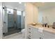 Modern bathroom with a glass-enclosed shower and sleek vanity providing a luxurious and functional space at 39493 N 107Th Way, Scottsdale, AZ 85262