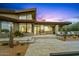 Modern home with a desert landscape, multiple lounge chairs, and a private pool at 39493 N 107Th Way, Scottsdale, AZ 85262